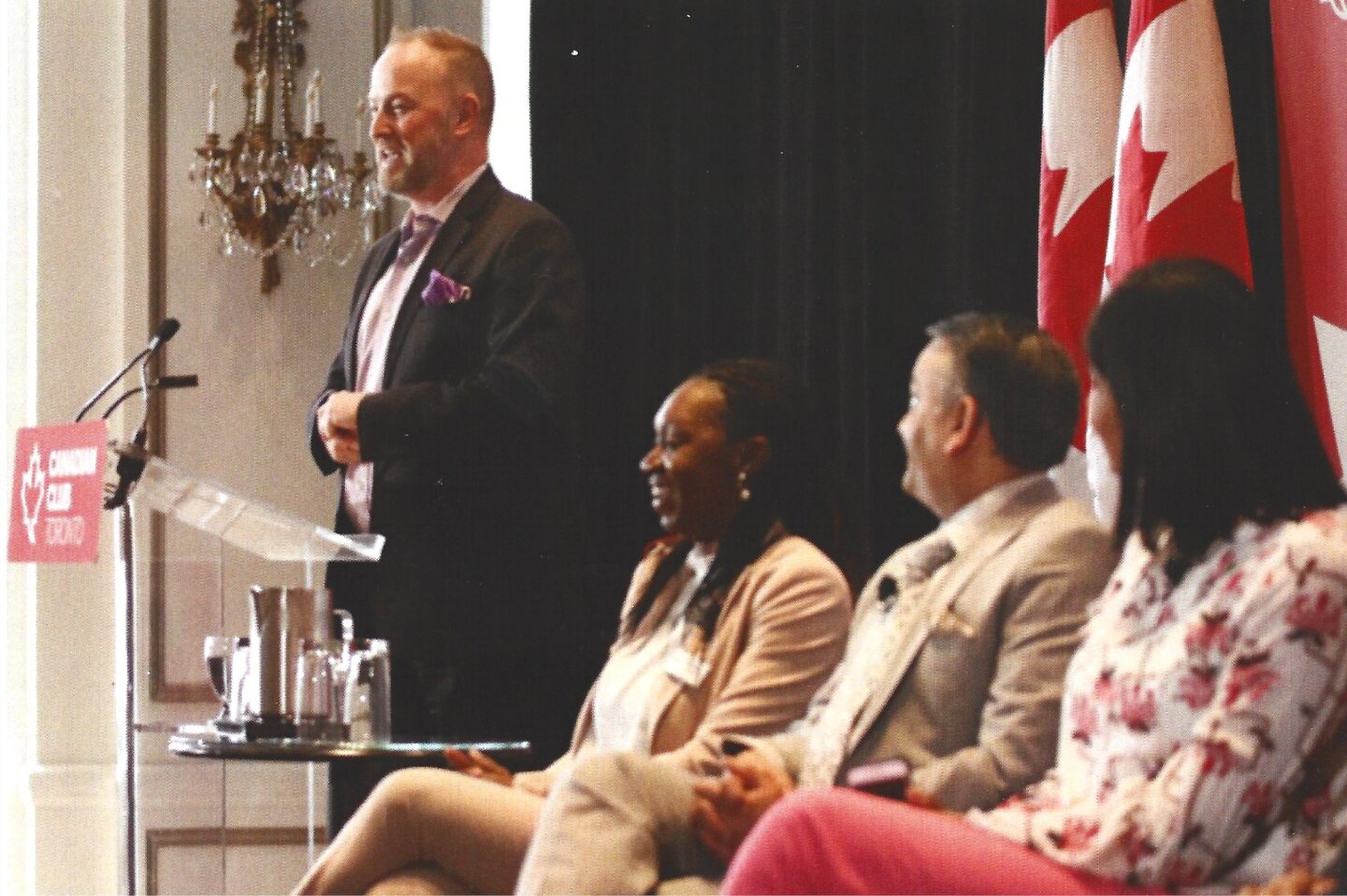 Michael Bach speaking at a Canadian Club panel